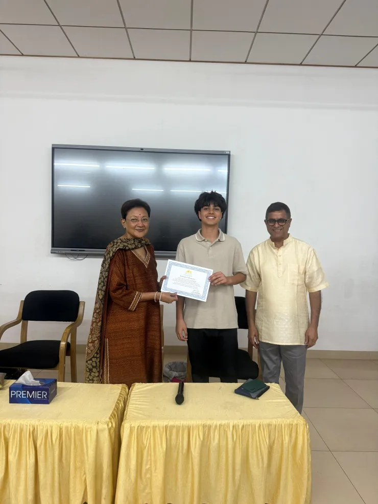 Certificate presented by Sheela Balaji of AIM for Seva / Swami Dayananda Trust